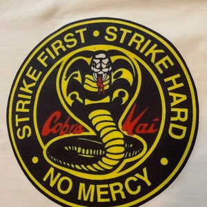Cobra Kai Premium T-Shirt in Mens sizes S-3XL in black or white! Printed on Kirkland brand T-Shirts!