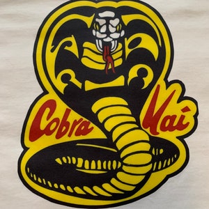 Cobra Kai premium T shirt in Mens sizes S-3XL in black or white! printed on Kirkland brand T-Shirts!