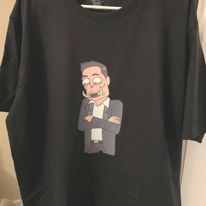 Elon Tusk from Rick & Morty premium T Shirt in Mens sizes S-3XL in black or white! Printed on Kirkland brand T-Shirts!