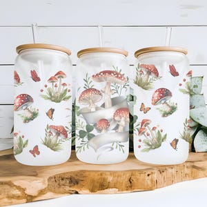 Mushroom and Butterfly 16 oz Frosted Libbey Glass Can With Bamboo Lid