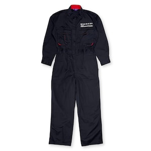 May include: Black workwear jumpsuit with red accents and the text "自動車整備士" in white on the chest.