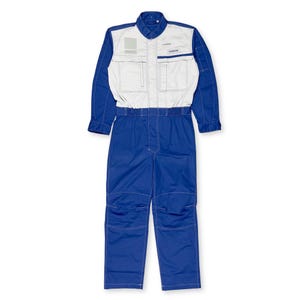 May include: A blue and white work jumpsuit with long sleeves and multiple pockets. The jumpsuit has a collared neckline and the word "NISSAN" is printed on the chest. The jumpsuit is made of a durable fabric and is designed for work environments.