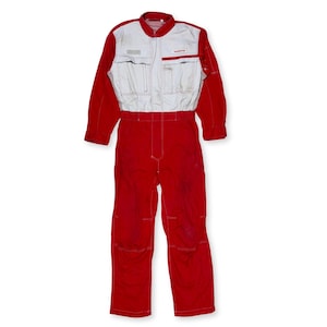 May include: Red and white work jumpsuit with the word "NISSAN" on the chest.