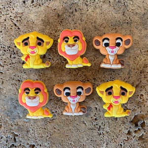 Lion king croc charms best sale
