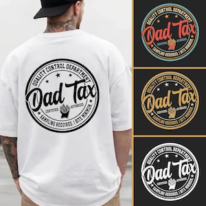 May include: White t-shirt featuring a circular graphic on the back with the words "Dad Tax". The design includes the words "Quality Control Department", stars, and a french fry graphic in black and white.