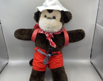 Vintage 1988 Mono de felpa Pan de Azúcar con mochila roja y sombrero blanco de 12 pulgadas.