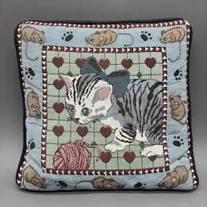 May include: A set of three ceramic mugs with a speckled, matte finish in cream, light grey, and dark grey. Each mug has a simple, minimalist design, suitable for coffee or tea.