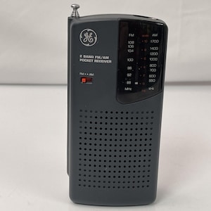 GE model 7-2584A Am/Fm Pocket Radio 2 Band receiver AM FM Working tested