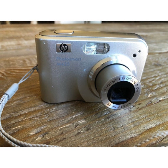 HP Photosmart M525 - fotocamera digitale 6,0 megapixel con custodia e HP Photosmart M525 - fotocamera digitale 6,0 megapixel con custodia e