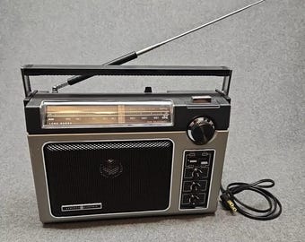 Receptor portátil de largo alcance GE 7-2880B AM/FM vintage, probado y en funcionamiento