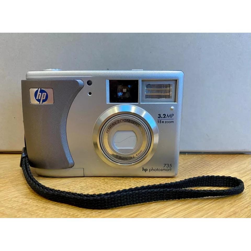OA機器 HP PHOTOSMART325 HP Photosmart 735 3.2 MP Digital Camera Model GRLYB-0210 15x Zoom