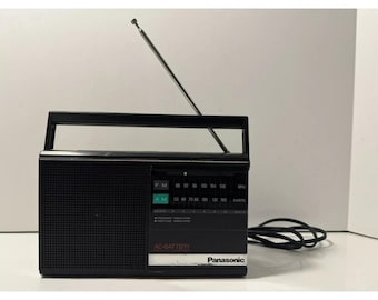 Rádio portátil vintage Panasonic RF-542 AM/FM testado e funcionando