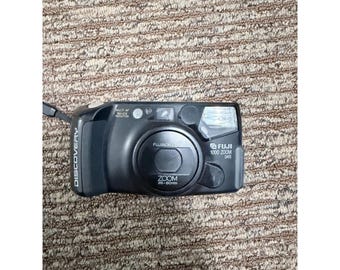Fuji Discovery 1000 ZOOM Point and Shoot 35mm Film Camera 35-80mm has a 1997 Sta