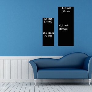 May include: Two black rectangular wall art pieces are displayed on a blue wall. The smaller piece is 9.4 inches (24 cm) wide and 28.34 inches (72 cm) tall. The larger piece is 14.17 inches (36 cm) wide and 43.3 inches (110 cm) tall.