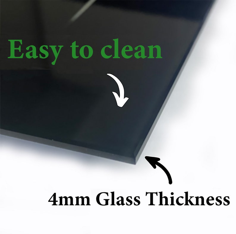 May include: A close-up of a black glass panel with the text "Easy to clean" in green and "4mm Glass Thickness" in black. White arrows point to the glass surface and edge. The glass is 4 millimeters thick.