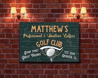 May include: A green wooden sign with the text "MATTHEW'S Professional & Amateur Golfers GOLF CLUB GOOD TIMES GREAT FRIENDS EST. 2015 DENVER. CL" in yellow lettering. A golf club and golf ball are depicted in the center of the sign.