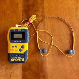 Vintage Sony Walkman  | Sports SRF-M70 FM/Am Radio | Clock Stopwatch | Yellow | Includes Sony Headphones MDR-W15 | All Working!