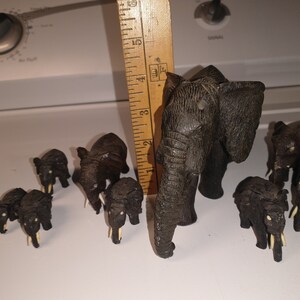 9 Antique Hand Carved Wood African Elephant Figurine Family. Free shipping in the US