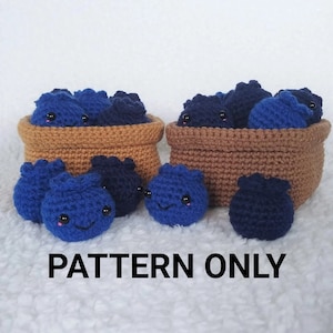 May include: Crochet pattern for a blueberry basket with a brown crocheted basket and blue crocheted blueberries. The pattern includes instructions for making the basket and the blueberries.  PATTERN ONLY.
