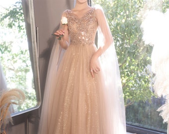 V-neck prom dress Cape sleeve dress Beaded ball gown Sequins bridal dress Sparkle glitter tulle ball gown Champagne graduation gown