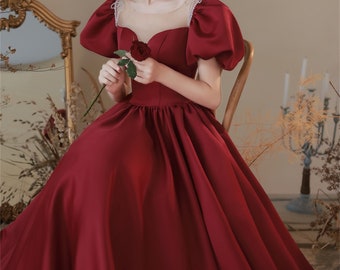 Burgundy puffy prom dresses 2025