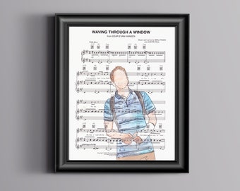 Puede incluir: Impresión enmarcada en negro con partituras con el título "Waving Through a Window" de Dear Evan Hansen. La impresión incluye una ilustración en acuarela de una persona con una camisa a rayas azules y una mochila.