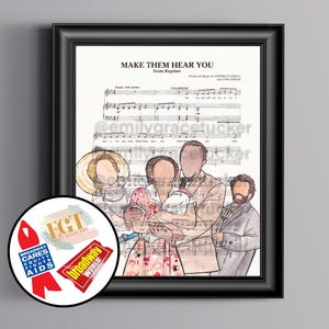 May include: Framed print featuring sheet music and a stylized illustration of a family. The text "Make Them Hear You" is visible. A Broadway Cares/Equity Fights AIDS sticker is in the corner.