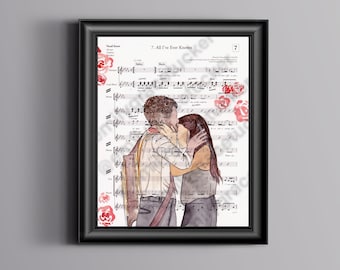 Puede incluir: Una impresión enmarcada con partituras con el título "All I've Ever Known". La obra de arte incluye una ilustración en acuarela de una pareja besándose, con acentos de rosas rojas. El marco es negro.