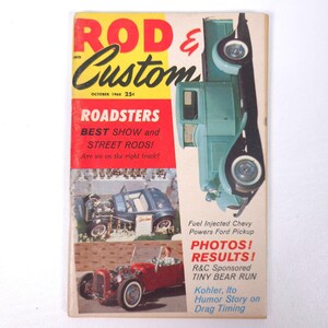 May include: Vintage "Rod & Custom" magazine cover from October 1960. The cover features a teal-colored pickup truck and images of roadsters. Text includes "Roadsters," "Best Show and Street Rods!" and "Fuel Injected Chevy Powers Ford Pickup."