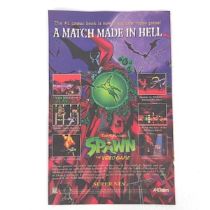 May include: Comic book advertisement for the video game "Spawn." The image features the title "A Match Made in Hell" and various game screenshots. The artwork includes Spawn, a character in a red cape, and the text "Super NES."