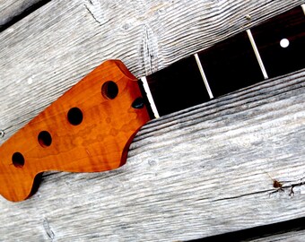 Jazz Bass neck, lefty, flamed roasted maple, 20 frets, leveled and polished, 9,5" radius