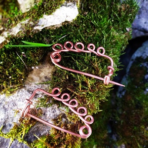 Ancient fibula Etruscan style