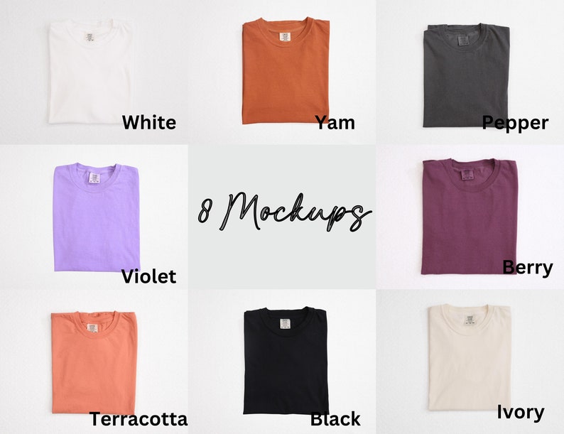 May include: Eight folded t-shirts in various colors, including white, yam, pepper, violet, berry, terracotta, black, and ivory. The text "8 Mockups" is written in cursive in the center of the image. The shirts are neatly arranged on a light background.