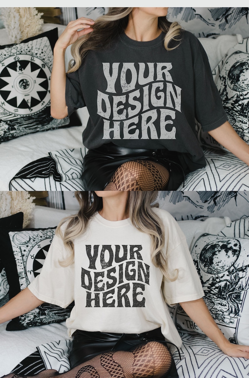 May include: Two women wearing oversized t-shirts with the text "YOUR DESIGN HERE" printed in a distressed, retro font. The shirts are in different colors, one is black and the other is white. Both women are wearing black skirts and fishnet stockings.