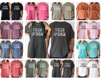 May include: A collection of 12 unisex t-shirts in various colors, including black, pink, red, green, blue, and white. Each shirt features the text "YOUR DESIGN" printed on the front.