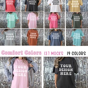 May include: A collection of 137 mockups featuring 19 different colors of oversized t-shirts. The t-shirts are displayed on models against a silver sparkly background. The text "Your Design Here" is printed on the front of each t-shirt.