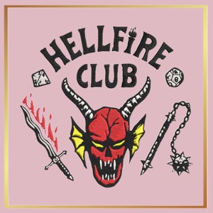 May include: A pink background with a black embroidered design. The design features a red devil head with yellow fins, two dice, a sword, a chain, and a spiked ball. The text "Hellfire Club" is written in a black circular banner.
