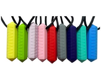 Collar masticable con gema texturizada: joyería para la estimulación sensorial en adultos