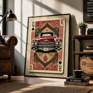 May include: A framed wall art print featuring a stylized playing card design with a red vintage Cadillac car at the center. The card includes the letters Q and K in the corners, intricate red and gold decorative patterns, and black spade symbols.