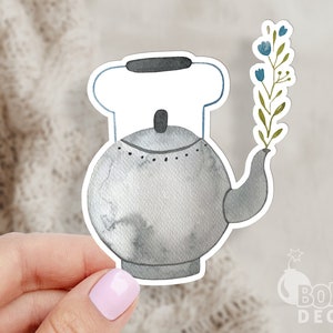 May include: A watercolor illustration of a gray teapot with a white lid and a sprig of blue flowers. The teapot has a spout and a handle. The flowers are in the spout of the teapot.