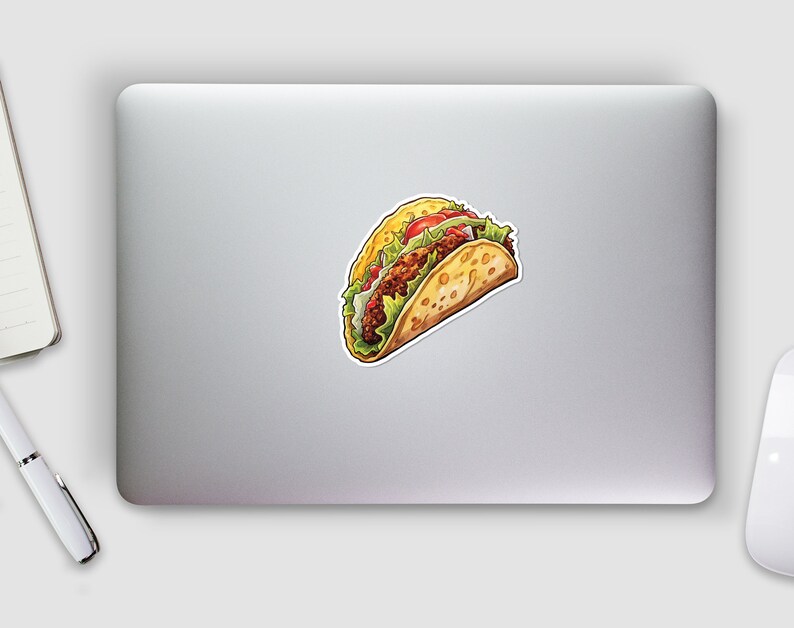 May include: A cartoon illustration of a taco with lettuce, tomato, and meat filling. The taco is on a white background.