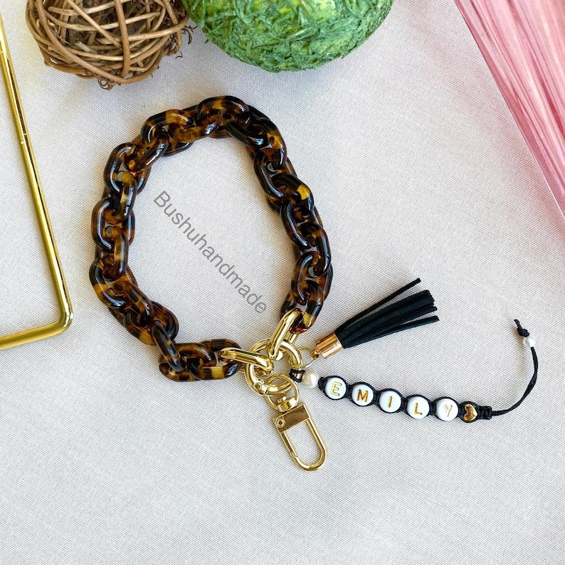 Personalized leopard acrylic wristlet keychain with beaded name charm and a cute boho tassel.