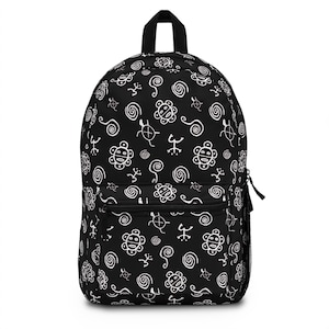 May include: Black backpack with a white pattern of traditional Taíno symbols, including the sun, a turtle, and a spiral design.