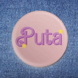 May include: A pink button with a purple word "Puta" in a retro font with yellow stars on either side.