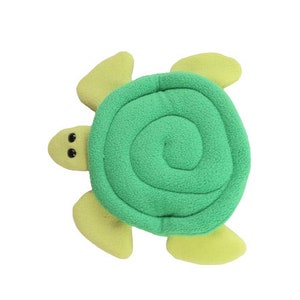 May include: A green and yellow plush turtle toy with a spiral shell. The turtle has black eyes and a friendly expression.