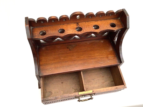 antique tobacco chest Mahogany England Pipe Stand Drawer Chest, No Key 41 1/4 W x 22 D x 52 1/4 HPackage Dimensions (Inches) Furniture of America Bellagrand Antique