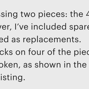 May include: Text on a grey background. The text states that the set is missing two pieces, the 4 Circles and 8 Circles. It also mentions spare blank tiles are included as replacements, cracks on four pieces, and a broken tray.