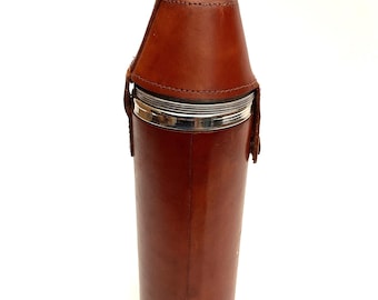 Petaca vintage de acero inoxidable forrada en cuero. Decantador de whisky de viaje.