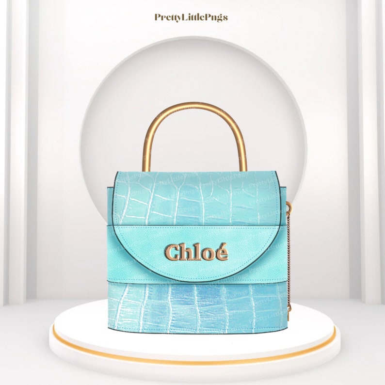 May include: A light blue handbag with a gold top handle and a gold chain strap. The bag has a crocodile-embossed texture and the word "Chlo&eacute;" is embossed on the front.