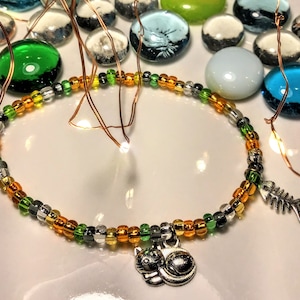 Calico Kitty Bracelet with Sleeping Cat and Fishbone Charms Orange, Green And Black